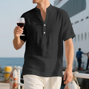 Close-up of black linen summer shirt with mandarin collar and three-button placket detail