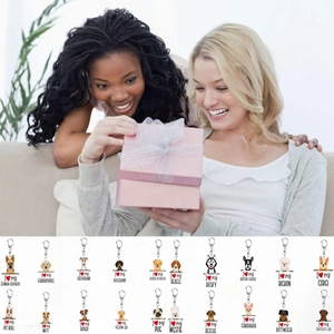 Detailed array of 20 personalized acrylic dog breed keychains with gift box scene