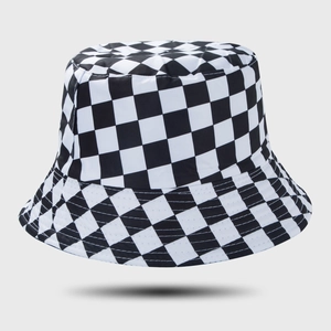 Detailed view of black and white checkerboard pattern on stylish flat-top bucket hat