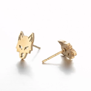 Detailed close-up of wolf-shaped gold stainless steel stud earrings on white backdrop