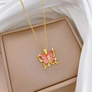 Elegant gold titanium steel necklace featuring a hollow pink butterfly pendant with crystals