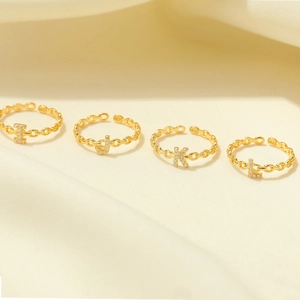 Elegant gold S925 sterling silver open rings with hollowed letters and sparkling cubic zirconia