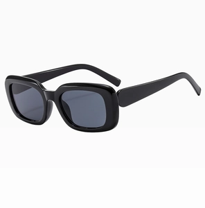 Side view of square sunglasses featuring thick black frames and dark tinted lenses