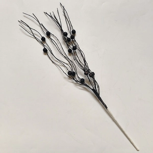 Detailed close-up of 43cm black Christmas berry branch with sparkling glitter finish