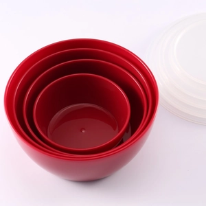 4-piece set of red round plastic food containers with clear lids for salad and storage