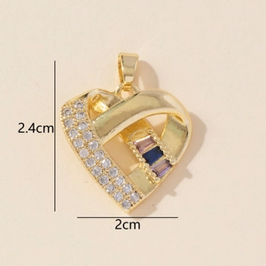 Detailed view of a gold heart pendant with zircon accents and 2.4cm by 2cm dimensions