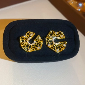 Golden hollow circular earrings with sparkling zircon inlay and French vintage design