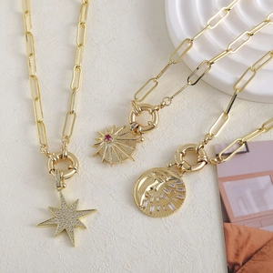 18K gold plated celestial necklace set with star, sun, and moon pendants on paperclip chain