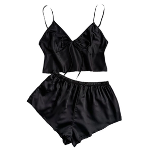 Women's black two-piece satin sleepwear set with camisole top and ruffled shorts