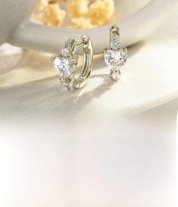 Detailed view of coffee gold heart earrings with zircon and size specifications