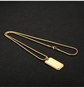 Polished gold rectangular military dog tag pendant on elegant snake chain necklace