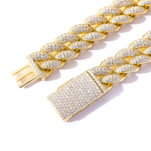 Close-up of 20mm gold-plated Cuban chain with micro-pave cubic zirconia on box clasp