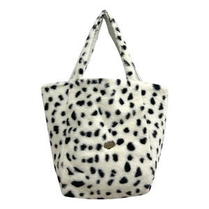 Fuzzy cow print plush tote bag with handmade metal tag for women winter fashion