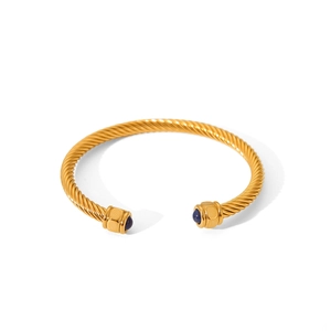Golden stainless steel twisted cable open bracelet with round blue stone accents
