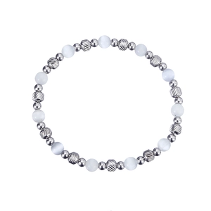 Macro detail of waterproof titanium steel bracelet with engraved silver beads and opal stones