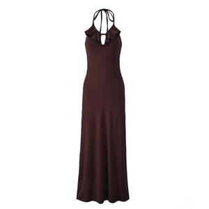 Detail of a dark brown halter dress with ruffled neckline and soft knit fabric texture
