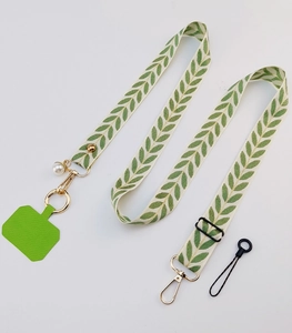 Adjustable crossbody phone lanyard with white leaf pattern strap and pearl pendant detail