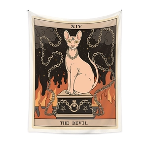 Detail of bohemian tapestry featuring a pink sphinx cat in a tarot devil card design