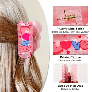 Pink marble hair claw clip with LOVE text pattern on brunette wavy hair for women