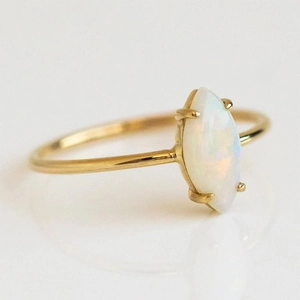 Minimalist S925 silver ring with marquise-cut opal on a gold-plated band for women