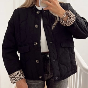 Vintage black quilted jacket for women with leopard print lining and button-down style