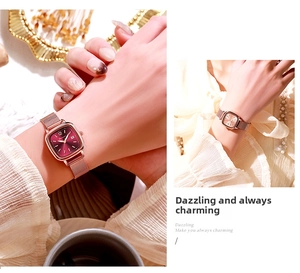 Detail of rose gold square watch with a gradient red dial and metallic mesh strap