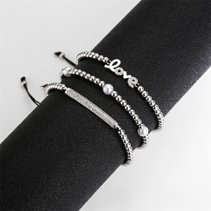 Three-piece silver bead and faux pearl bracelet set with Love charm and zircon inlay