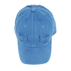 Close-up of distressed blue baseball cap with vintage frayed holes and cotton twill texture