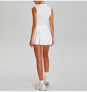 Rear view of pleated white tennis skirt showing athletic fit and high waist design