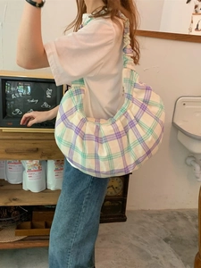 Plaid crescent shoulder bag in purple and green with pleated strap for casual daily use