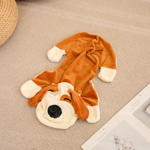Adorable brown and white puppy plush skin laying on a textured cream rug with a basket