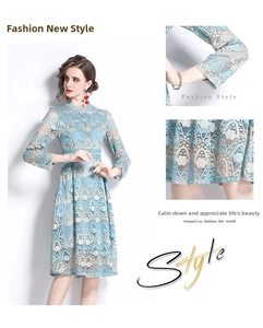 Detailed view of light blue lace embroidery, delicate hollow-out pattern and scalloped cuffs