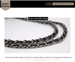Detailed close-up of a high-quality gunmetal chain strap woven with black leather texture