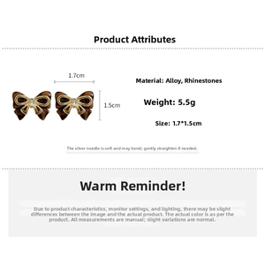 Detail showing 1.7x1.5cm bow stud earrings with leopard pattern and rhinestone inlay
