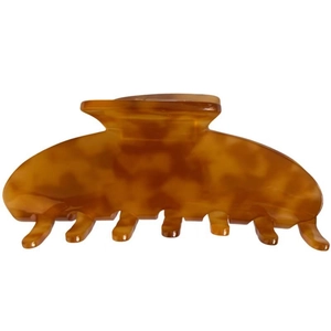 Large tortoiseshell hair claw clip with amber leopard print for thick hair styling