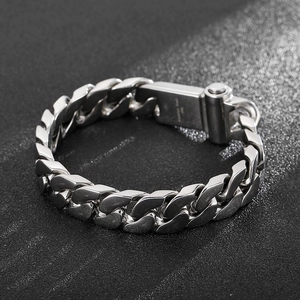 Detail of 316L stainless steel engraving on silver cuban link bracelet for men