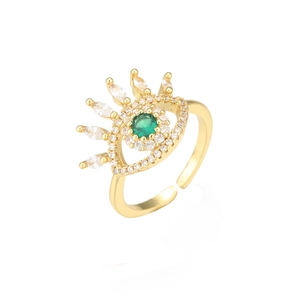Gold-plated adjustable ring featuring evil eye motif with green zircon and marquise stones