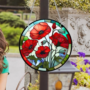 Hanging round acrylic floral pendant with red poppy design and metallic chain decoration