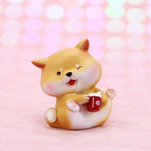 Cute Shiba Inu car dashboard ornament holding a fortune cup on a pink background