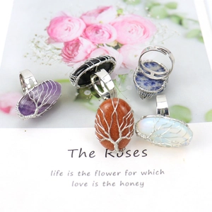 Handmade Tree of Life wire wrapped crystal rings with oval gemstones in five colors