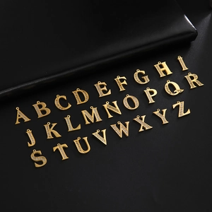 Gold plated titanium steel A-Z alphabet pendants with sparkling pavé cubic zirconia