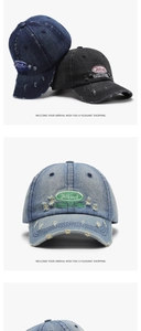 Detail of distressed vintage denim baseball caps with Alfred embroidery and worn edges