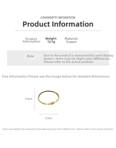 Detail showing gold-plated arrow cross bangle dimensions of 6.5cm by 5.5cm and 12.1g weight
