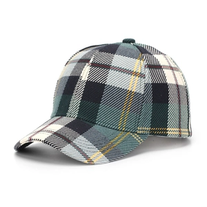 Macro detail of high-quality tartan pattern fabric and stitching on a baseball cap