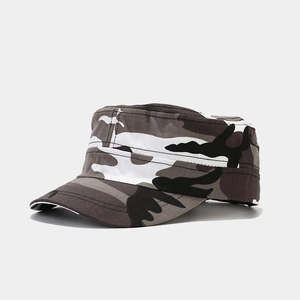 Detail of gray camo flat top military cap showing cotton canvas fabric and brim