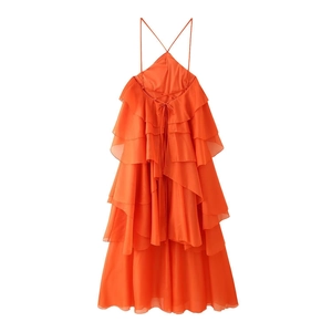 Detail of orange tiered ruffle dress showing open back with delicate self-tie straps