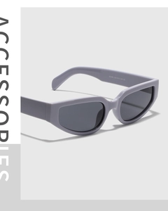 Detail view of cat eye sunglasses showing size parameters 58-18-140 and CE certification