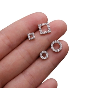 Surgical steel butterfly stud earrings set with sparkling CZ stones and geometric shapes