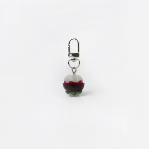 Realistic mangosteen keychain pendant with purple shell and silver lobster clasp