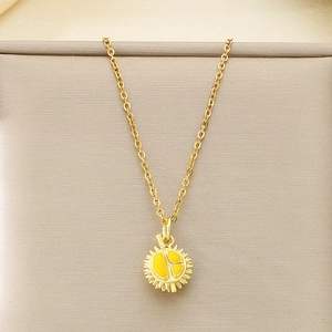 Close-up of golden stainless steel necklace featuring a creative enamel durian fruit pendant